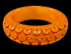 vintage chunky pumpkin bakelite bangle with sucker carving